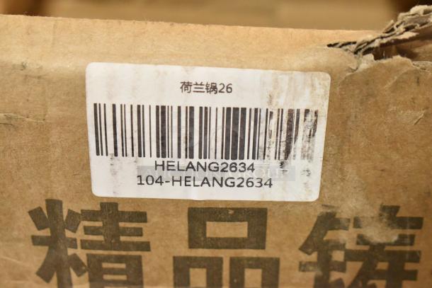Box with visible label showing barcode and "HELANG2634" marking, indicating a set of cast iron pots/skillets.