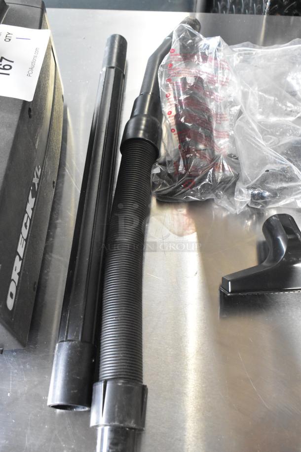 Oreck XL BB880-AD Vacuum Cleaner, 120 Volts, with hose and attachments, good condition, visible model branding.