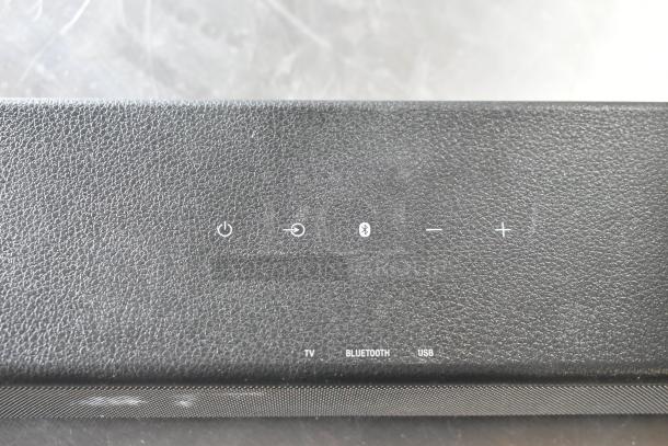 Sony HT-S100F Sound Bar, black, with power, input, Bluetooth, volume controls, and TV, Bluetooth, USB labels.