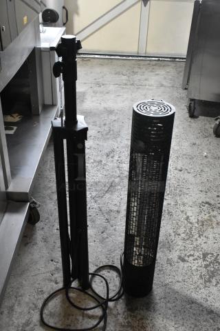 Lifestyle LS-HEAT-BLACK infrared electric patio heater on a tripod stand, 120V, 1 Phase, in used condition.