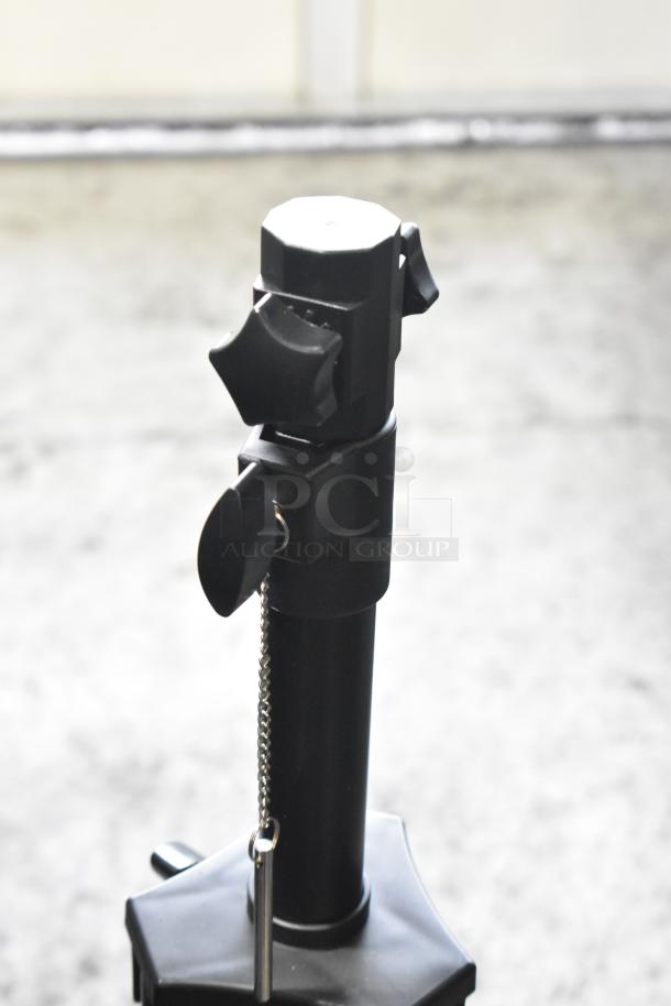 Lifestyle LS-HEAT-BLACK infrared patio heater on tripod stand, 120V, 1 Phase. Black finish, chain pull switch visible.