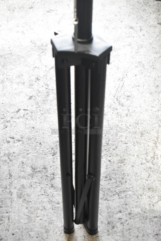 Lifestyle LS-HEAT-BLACK infrared electric patio heater on tripod stand, 120 volts, black finish, sturdy build, adjustable height.