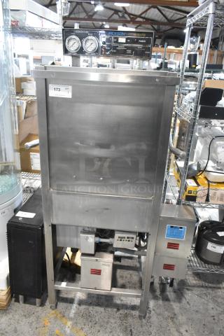 Jackson Stainless Steel Commercial Straight Pass Through Dishwasher, visible gauges, model and condition appear intact.