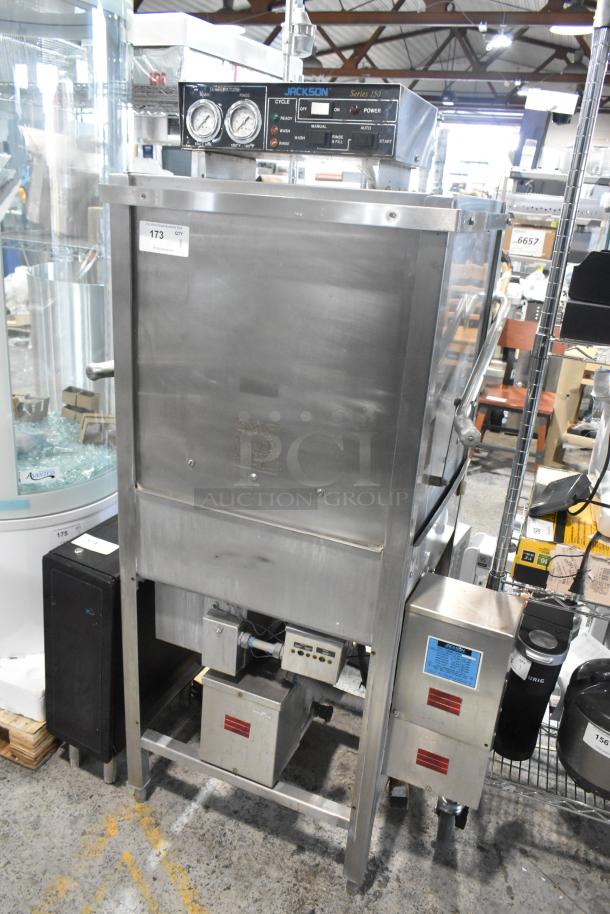 Jackson Stainless Steel Commercial Straight Pass Through Dishwasher in good condition. Features control panel, gauges, and labels.