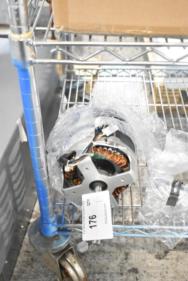 Brand new Nidec D29R/T Motor; 120 volts, 1 phase, minor scratches; wrapped on a metal cart with auction tag 176.