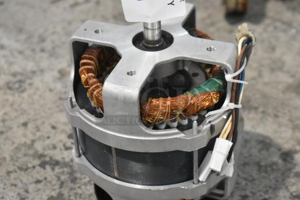 Brand new Nidec D29R/T motor, 120V, 1 phase. Visible copper coils, minor scratches, ideal for repairs or projects.