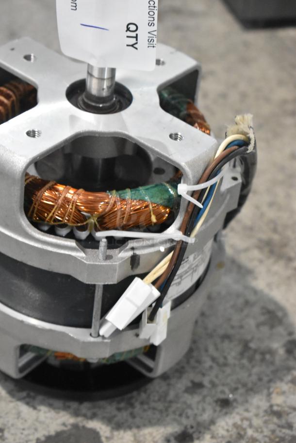 BRAND NEW Nidec D29R/T motor, 120V, 1 Phase, slight scratches, visible wiring and labels.