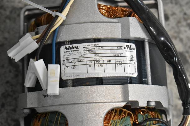 Brand new Nidec D29R/T motor, 120 volts, 1 phase. Tags show model NP150093 G24 001; made in Hungary.