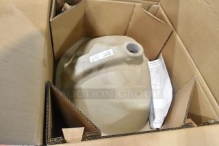 Brand new sink basin with minor scratches and dents, packed in cardboard, includes instructions and barcode label visible.