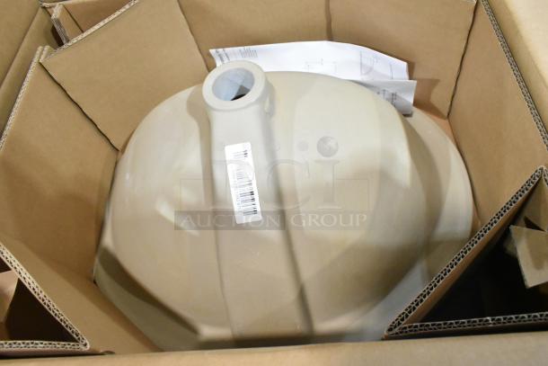 Brand new sink basin with minor scratches and dents, in packaging. Visible barcode label and included instructions.