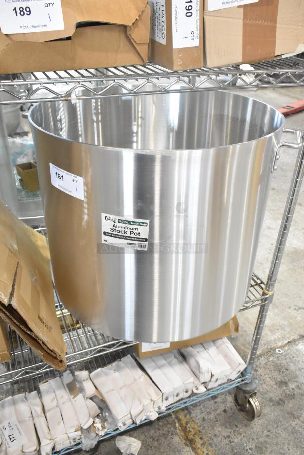 BRAND NEW Choice 471SP140QTHD 140 Qt. Heavy Weight Aluminum Stock Pot on shelf, small dent visible, with label.