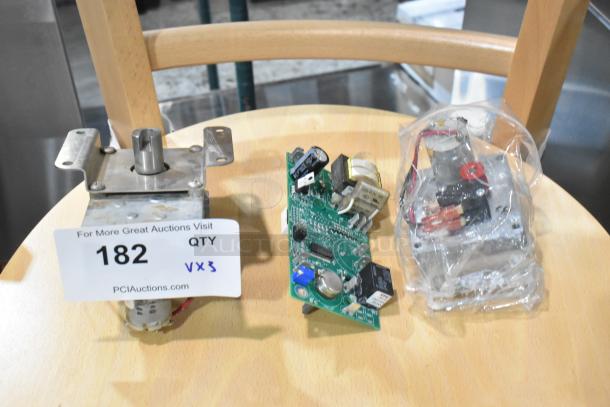 Three new scratch and dent items: HP2HT689 Perfect Fry 83231 Motor and Gearbox Assembly for PFC Series, with auction tag.