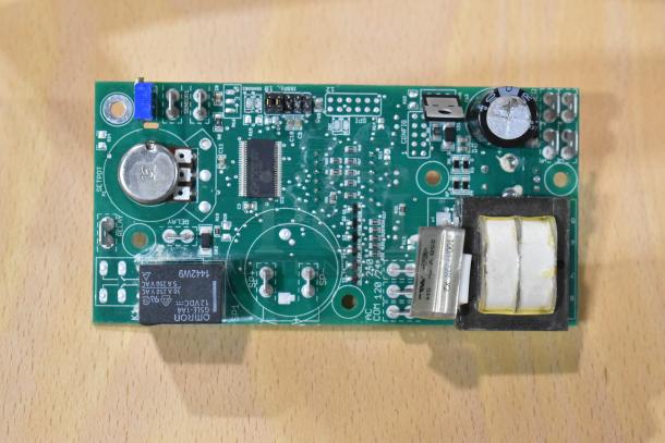 HP2HT689 Perfect Fry motor and gearbox assembly PCB, brand new with minor scratches, components labeled with voltage details.