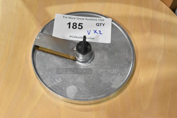 2 Robot Coupe food processor blades, J6x6 and E8 S5/16 models. Slightly used, metal finish, auction tag visible.