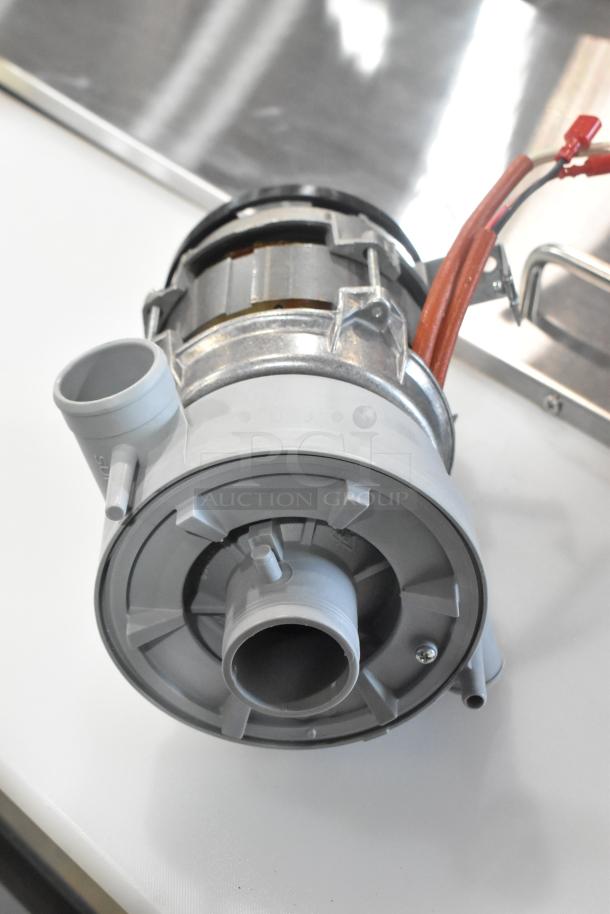 BRAND NEW SCRATCH AND DENT! Noble Warewashing 4952975138 wash pump for LT-UC24, metallic and grey casing, minor blemishes.