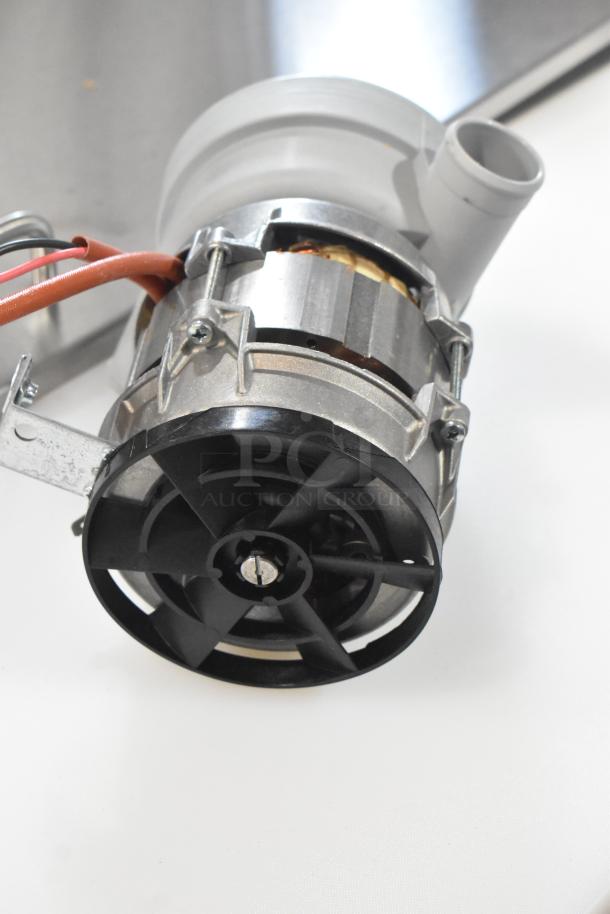 Brand new Noble Warewashing wash pump 4952975138 for LT-UC24. Some minor scratches and dents visible.