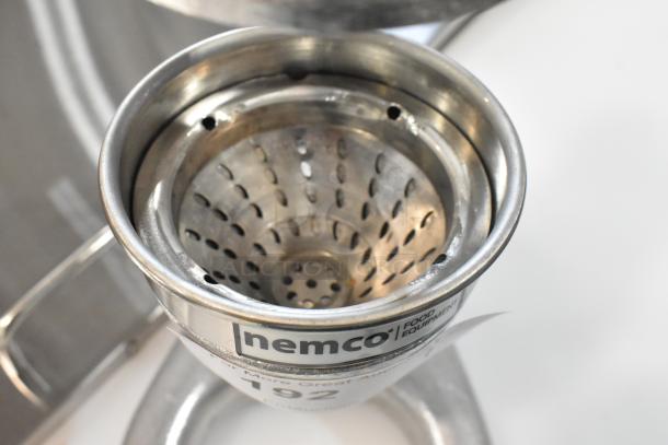 BRAND NEW Nemco 55850 Manual Easy Citrus Juicer, stainless steel, heavy-duty design. Scratch and dent condition. Labels visible.