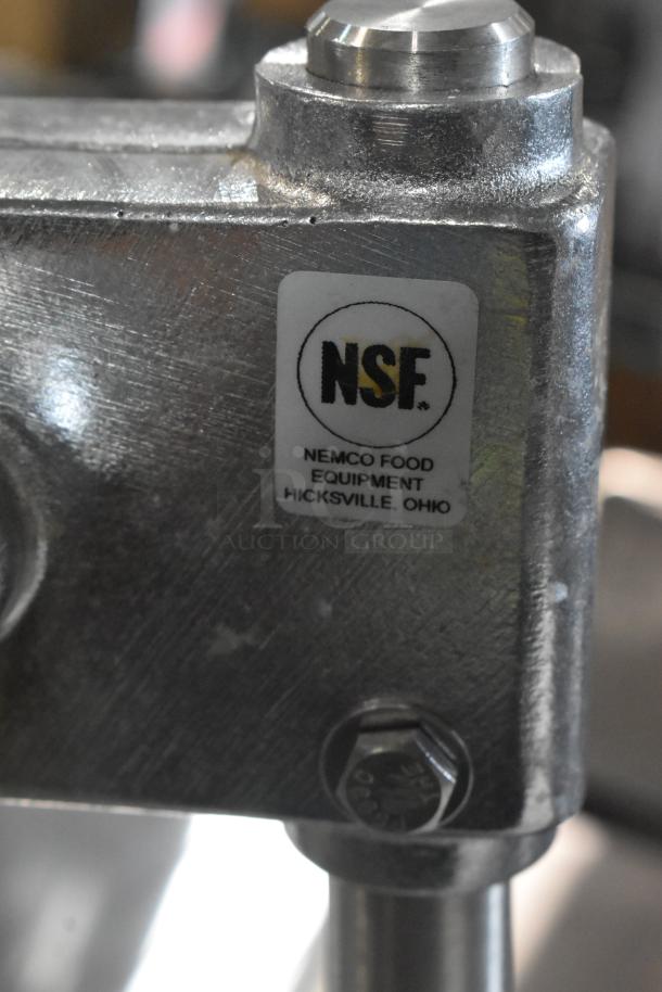 BRAND NEW Nemco 55850 citrus juicer, scratch and dent condition. Features an NSF label from Hicksville, Ohio.