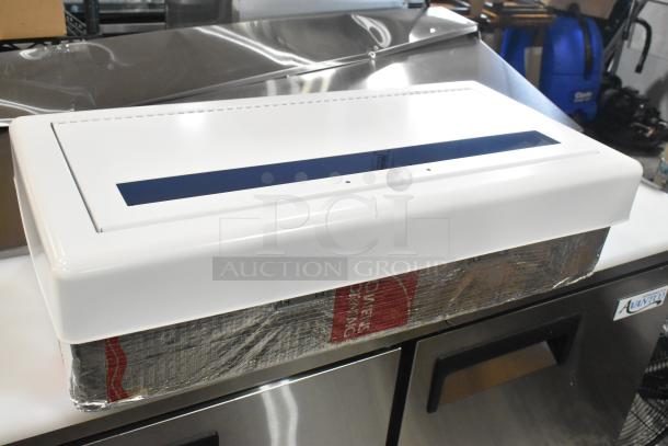 BRAND NEW SCRATCH AND DENT JL Industries 1017V10FX2 white fire-rated steel fire extinguisher cabinet with vertical window.