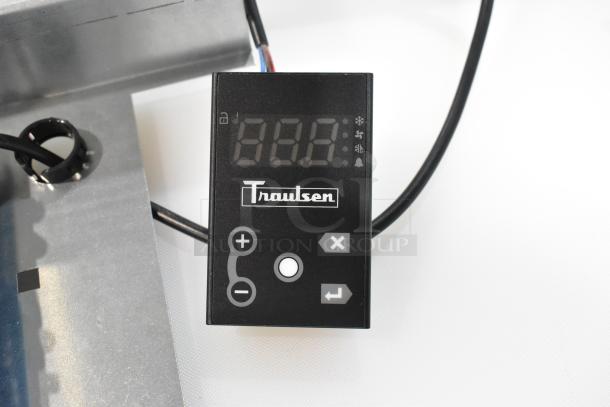 Brand new Traulsen control panel, slight scratch and dent. Features digital display, control buttons, and wiring.