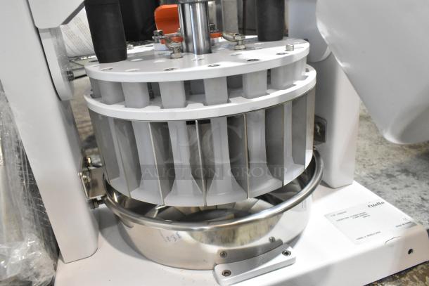 Brand new Estella 348MDD36 manual dough divider, 6.6 lb. capacity, 36 parts, minor scratches, durable construction.