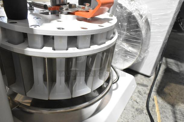 Brand new Estella 348MDD36 manual dough divider with 6.6 lb. capacity, 36-part division, visible scratch and dent.