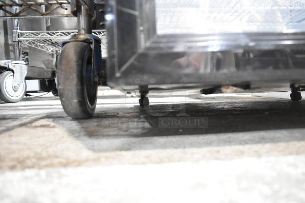 Brand new Avantco 360SC80 metal mini cooler merchandiser, scratch and dent, 110-120 volts, 1 phase, viewed from the bottom.