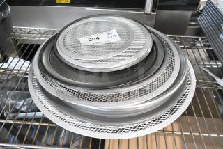 18 brand new metal mesh pans and round perforated baking sheets with visible label indicating lot 204, scratch and dent.