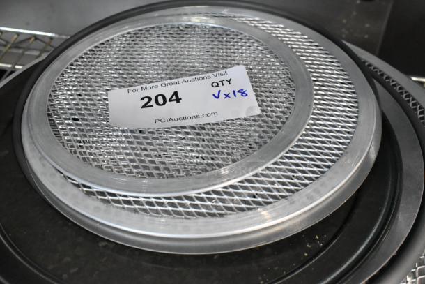 18 new scratch and dent metal mesh pans and round perforated baking sheets, showing lot number 204, quantity x18.