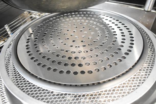 18 new scratch and dent items: metal mesh pans and round perforated baking sheets. Perfect for kitchen use.