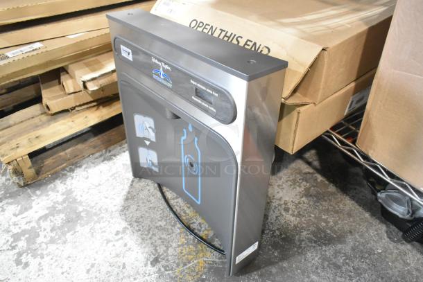 Brand new Halsey Taylor water bottle filling attachment for water fountain, shown in packaging. Scratch and dent condition.