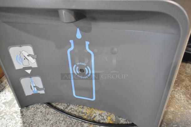 New scratch and dent water bottle filling attachment for fountain, sensor-activated. Features instructional icons.