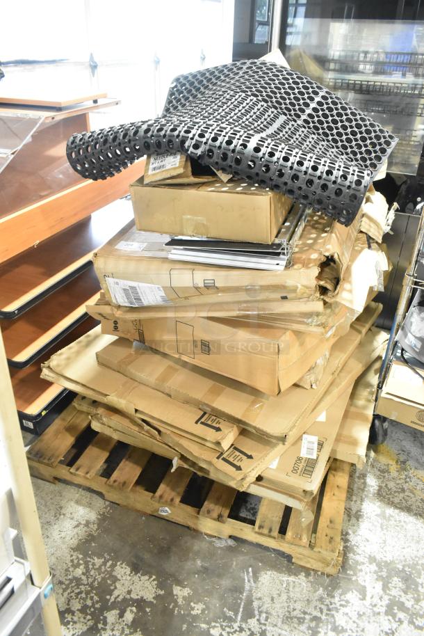 14 new scratch and dent items including anti-fatigue mat, NR0034CH rib, 00311 drawer, 7306-DS-SLV dispenser on pallet.