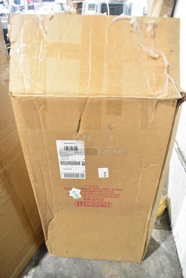 Brown shipping box containing Brand New Scratch and Dent Blodgett vent pieces, unopened but damaged packaging.