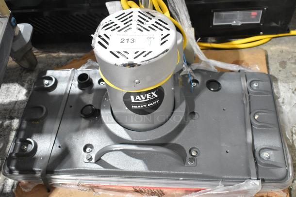 Brand new Lavex SP-2805 floor cleaning machine, with minor scratches, 120 volts, 1 phase. Label indicates heavy-duty use.