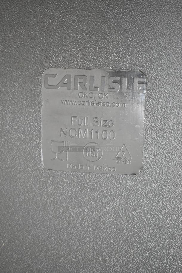 ALT Text: Carlisle NCM1100 black poly drop-in bin, new with scratches and dents. Label shows NSF certification and made in Mexico.
