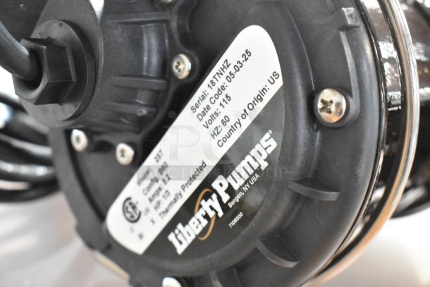 Liberty Pumps 257 sump pump, new with minor scratches, 1/3 hp, 115V, vertical magnetic float switch, model details visible.
