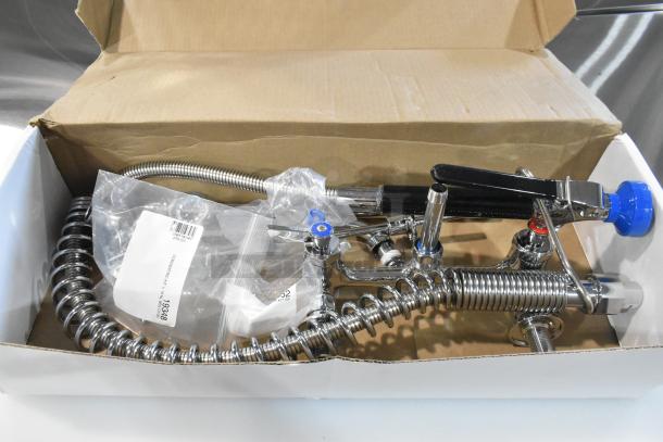 BRAND NEW Fisher 34450 pre-rinse faucet with 12" bracket, 16" riser, 10" nozzle, 36" hose. Scratch and dent condition.