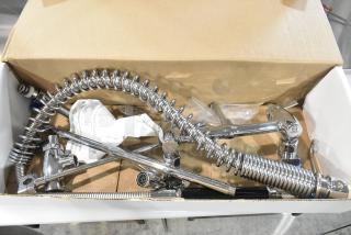 Brand new Fisher 34034390 wall-mount pre-rinse faucet set with 12" wall bracket, 16" riser, 12" swing nozzle, 36" hose.