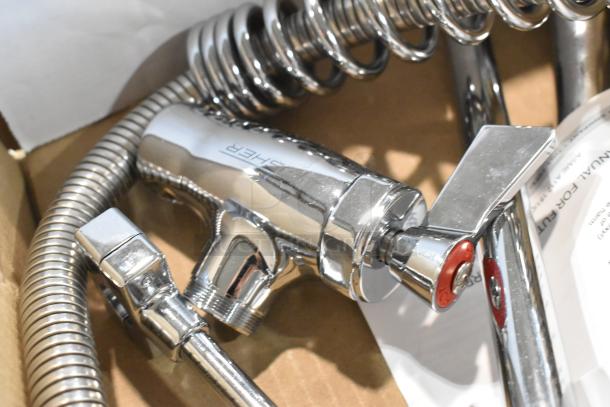 BRAND NEW SCRATCH AND DENT Fisher 34390 wall-mount pre-rinse faucet, 12" bracket, 16" riser, 12" swing nozzle, 36" hose.