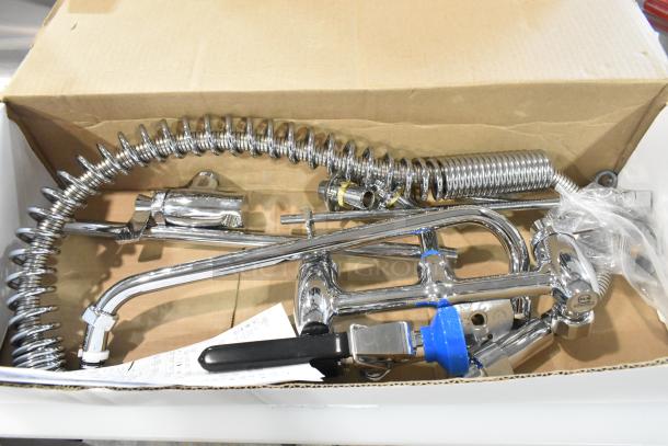Brand new Fisher 34470 backsplash-mount pre-rinse faucet, 12" wall bracket, 16" riser, 14" swing nozzle, 36" hose, in box.