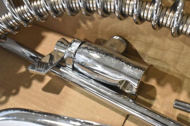 Brand new Fisher 34470 pre-rinse faucet, scratch and dent, with 12" wall bracket, 16" riser, 14" nozzle, and 36" hose.