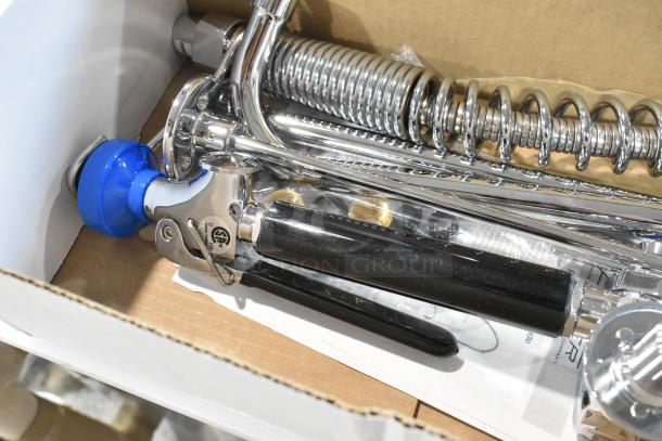 Brand new Fisher 34410 pre-rinse faucet with 12" wall bracket, 16" riser, 12" swing nozzle, and 36" hose, scratch and dent condition.