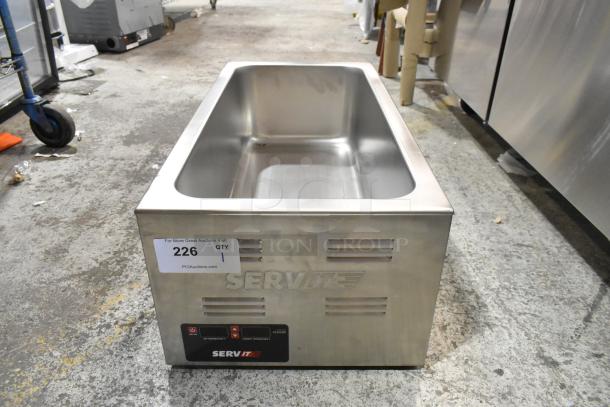 Brand new ServIt 423FW150L electric countertop food warmer, 12" x 27", digital controls, 120 volts, minor scratches.