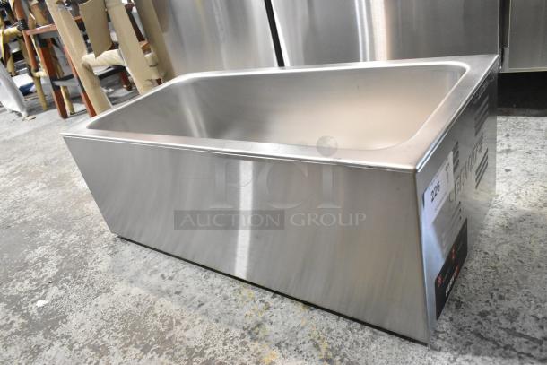 Brand new ServIt 423FW150L electric countertop food warmer. Scratch and dent condition, 12" x 27", with digital controls.