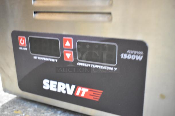 Brand new ServIt 423FW150L electric countertop food warmer with digital controls, 12" x 27", 120V, 1-phase, minor scratches.