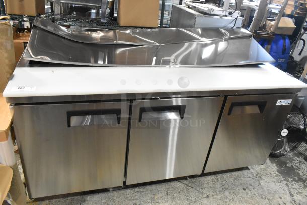 Avantco 178APT71HC stainless steel sandwich salad prep table with bain marie mega top, new scratch and dent condition, on casters.