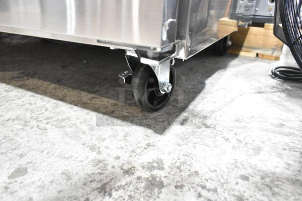 BRAND NEW Avantco 178APT71HC prep table caster detail; high-quality stainless steel, commercial-grade caster for mobility.