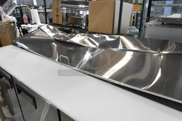 Avantco 178APT71HC stainless steel prep table with visible scratches and dents. Commercial casters, 115V, 1 Phase.