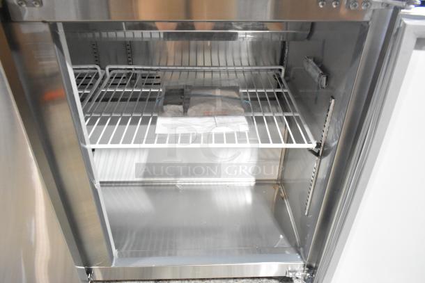 Brand new 2024 Avantco 178APT71HC stainless steel commercial sandwich prep table, mega top, visible interior with wire shelf.